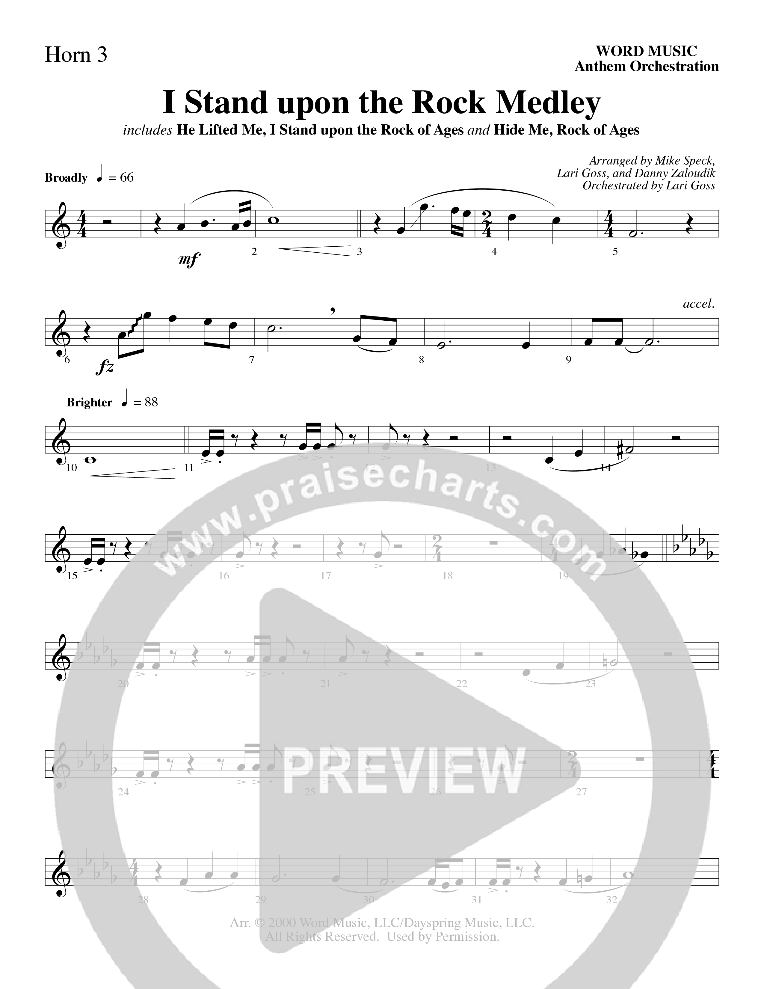 I Stand Upon The Rock Medley (with He Lifted Me, I Stand Upon The Rock Of Ages and Hide Me Rock of A (Choral Anthem SATB) French Horn 3 (Word Music Choral / Arr. Mike Speck / Arr. Danny Zaloudik / Arr. Lari Goss / Orch. Lari Goss)